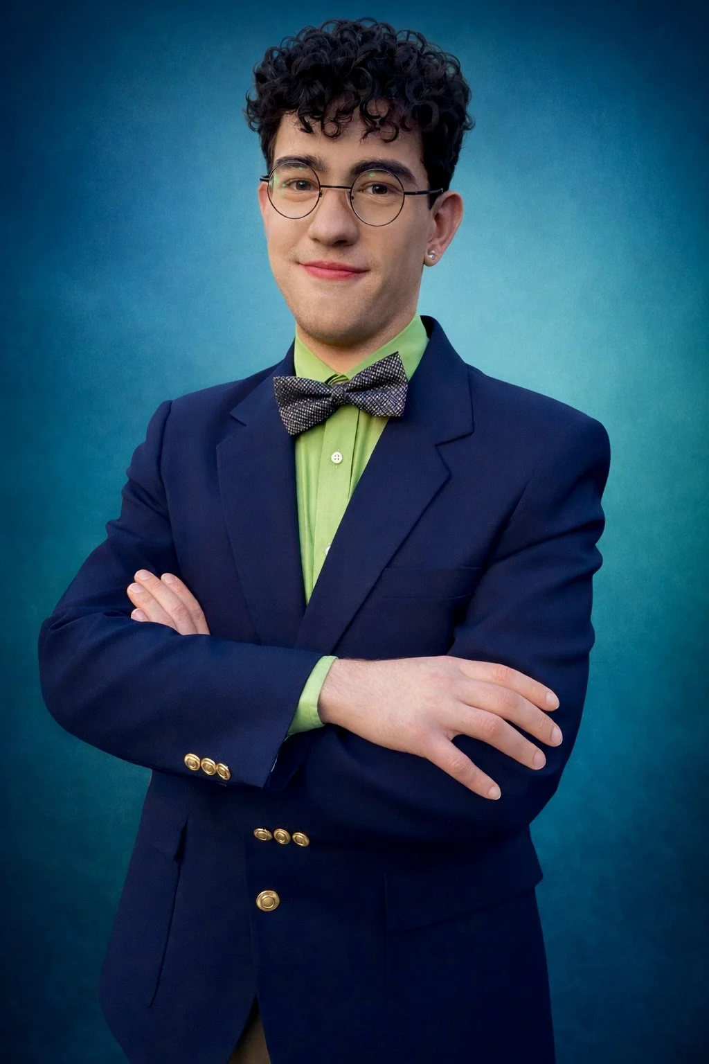 Drew in a formal academic portrait.